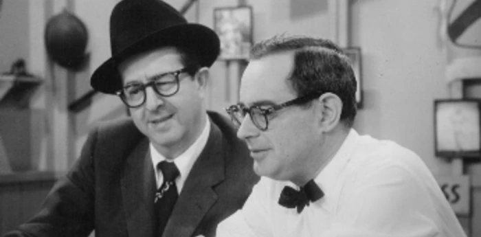 Phil Silvers and Nat Hiken look over a script.
